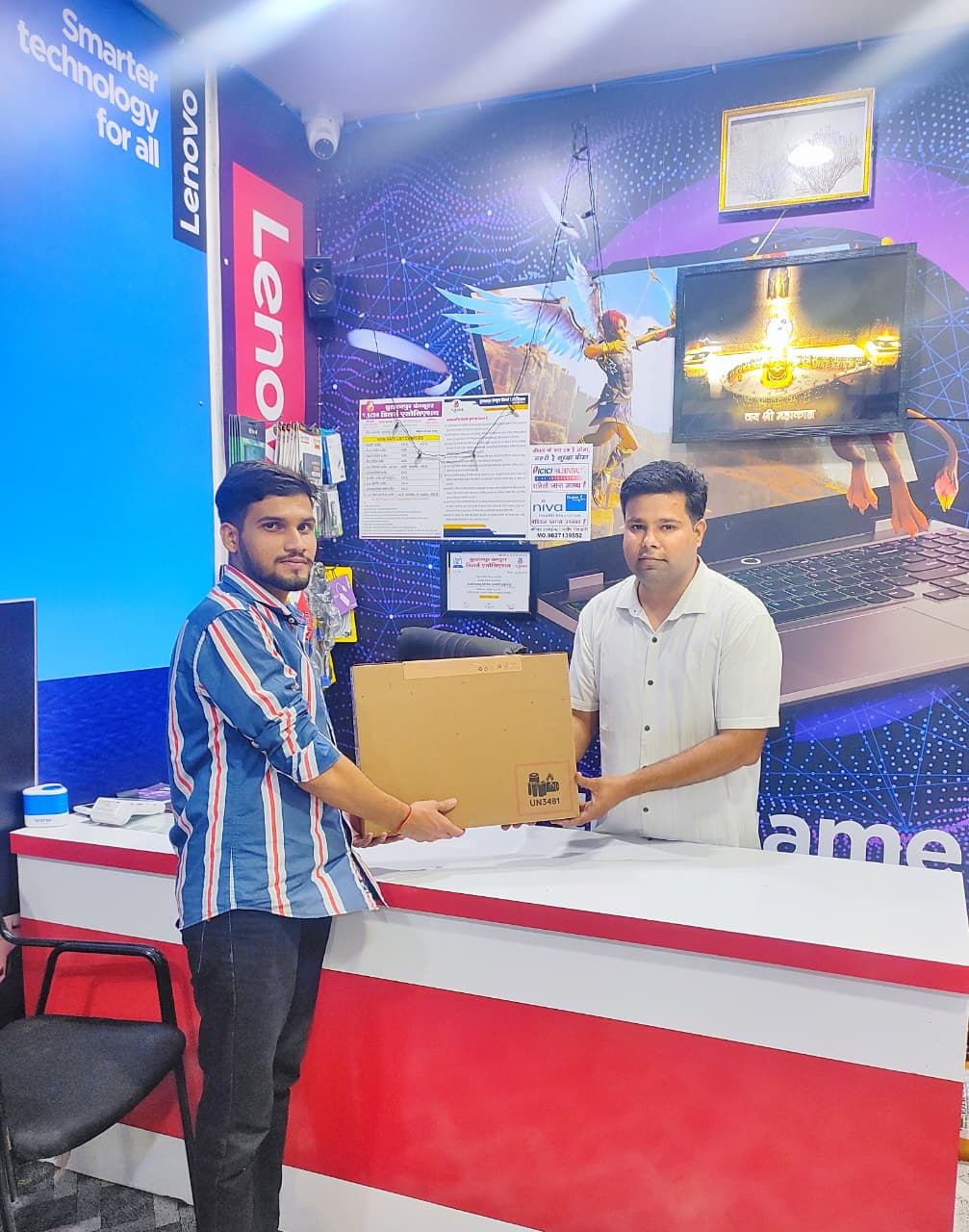 Customer collecting new laptop